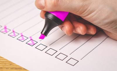 make a plan check list with neon pink marker